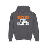 Youth Hoodie "Unscared Still Collecting" — Bold Halloween/Motivational Kids Sweatshirt